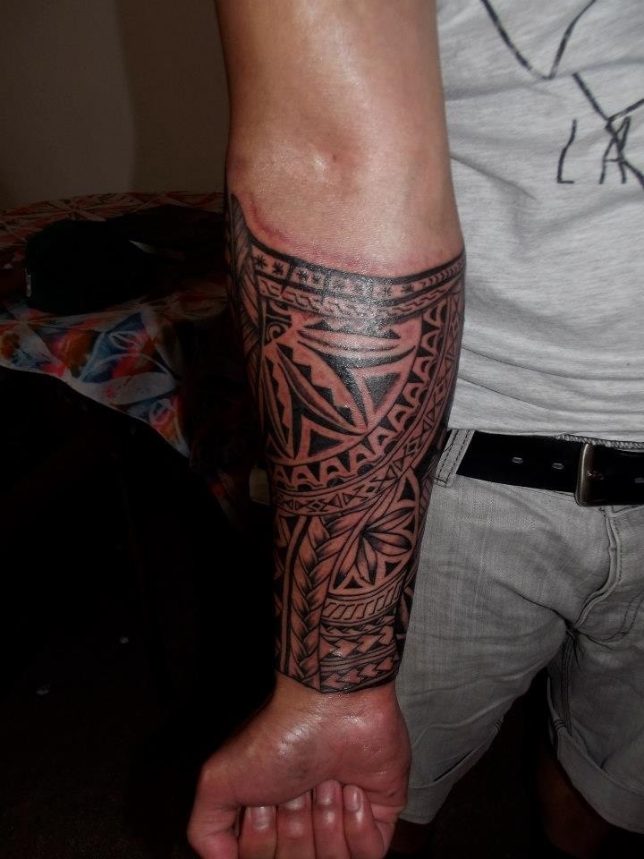 Cool tribal sleeve tattoo for men on forearm - Tattooimages.biz
