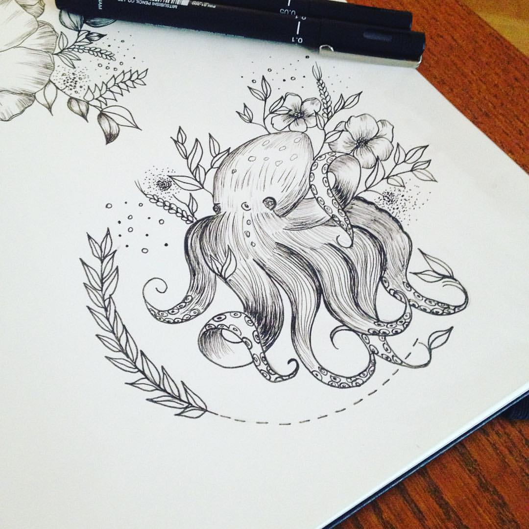 Cute small blackandwhite octopus with flowers tattoo design