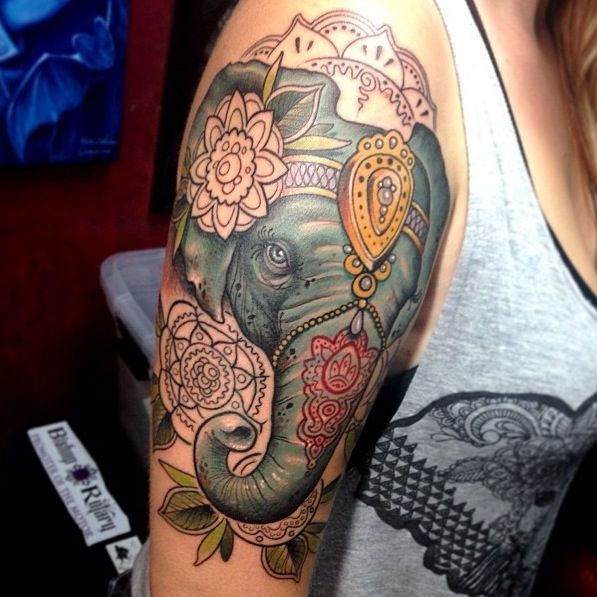 big_colored_elephant_head_tattoo_on_half_sleeve.jpg