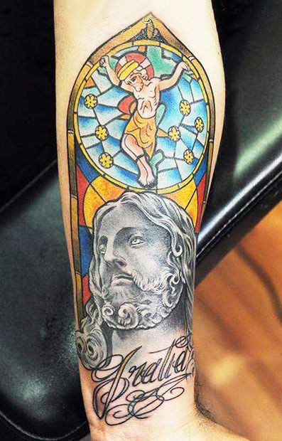 Coloured crucifixion of jesus forearm tattoo - Tattooimages.biz