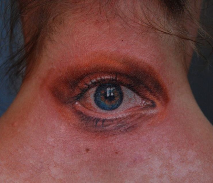 Realistic eye tattoo on neck  Tattooimages.biz