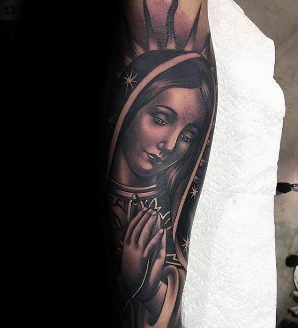Religious style large sleeve tattoo of praying woman ...