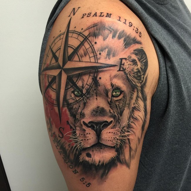 Unusual combined colored lion head tattoo on shoulder with nautical