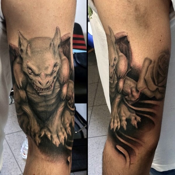 3D style very detailed biceps tattoo of gargoyle statue with rose