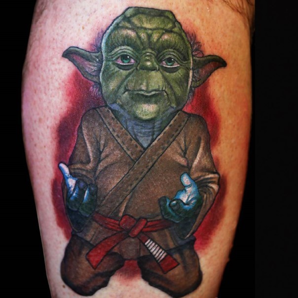 3D cartoon like painted and colored leg tattoo of Star Wars Yoda