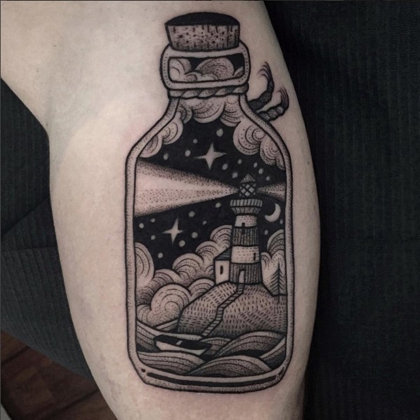 3D interesting painted black ink bottle tattoo on arm with night lighthouse