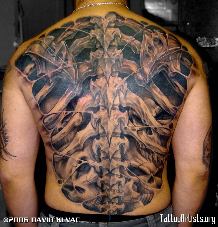 3D like awesome detailed massive bones tattoo on whole back