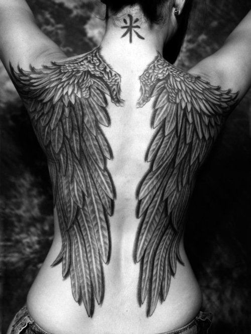 3D like big detailed black and white angel wings tattoo on back