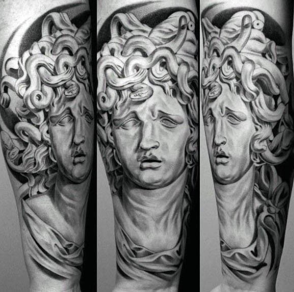 3D like black and white Medusa statue tattoo on arm