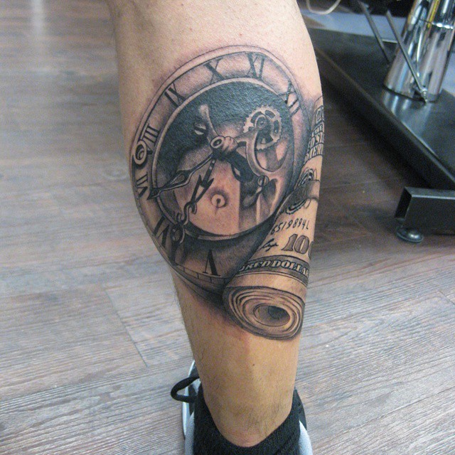 3D like black ink antic mechanic clock tattoo on leg with dollars roll