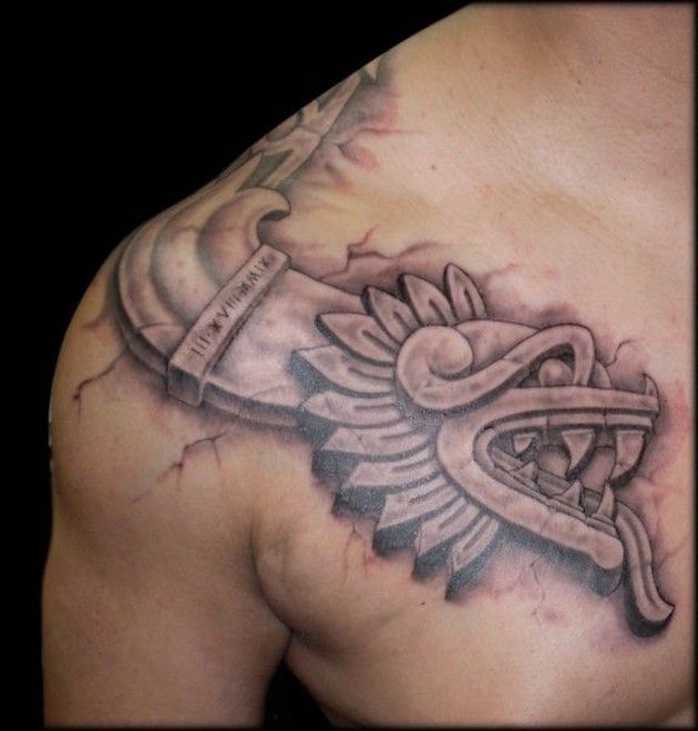 3D like black ink shoulder and chest tattoo of tribal dragon sculpture