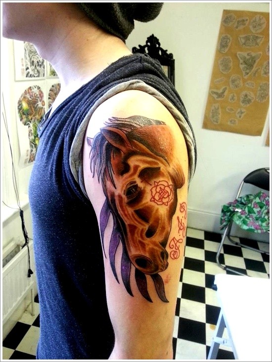 3D like colored brown horse tattoo on shoulder stylized with flower