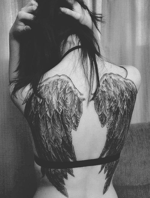 3D like detailed black ink wings tattoo on upper back