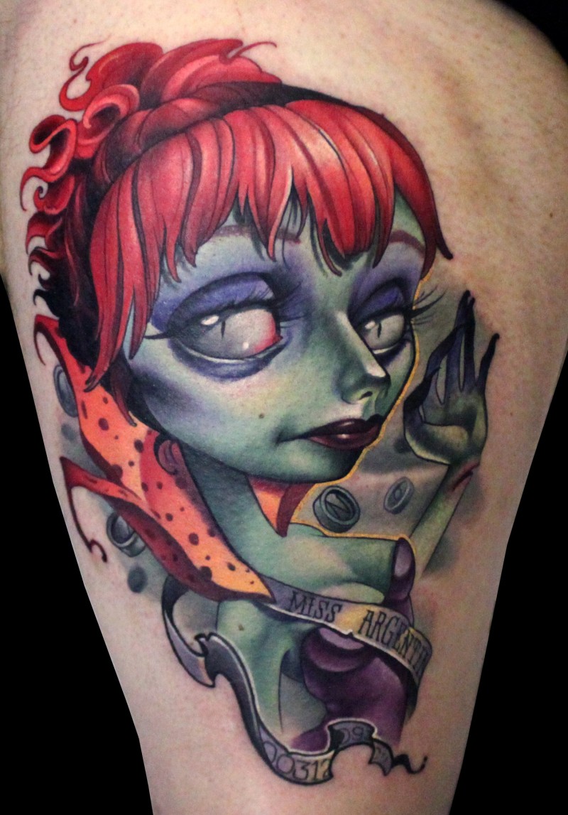 3D like detailed colorful monster woman tattoo stylized with lettering
