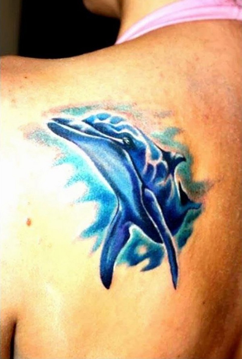 3D like little colored dolphin tattoo on shoulder