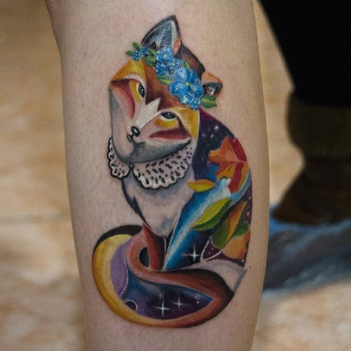 3D like little colored fox tattoo stylized with flowers and space