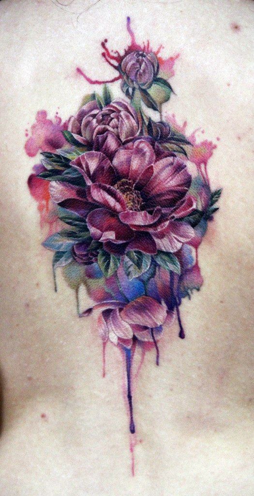 3D like multicolored big realistic flowers tattoo on whole back