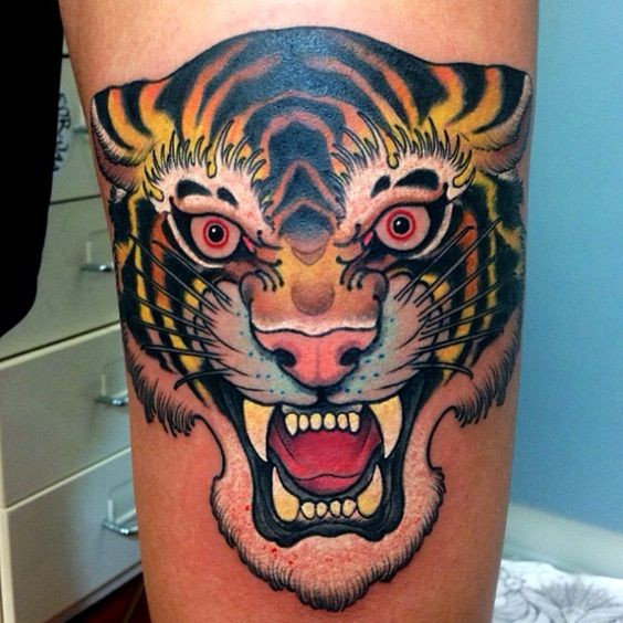 3D like multicolored roaring tiger tattoo on arm