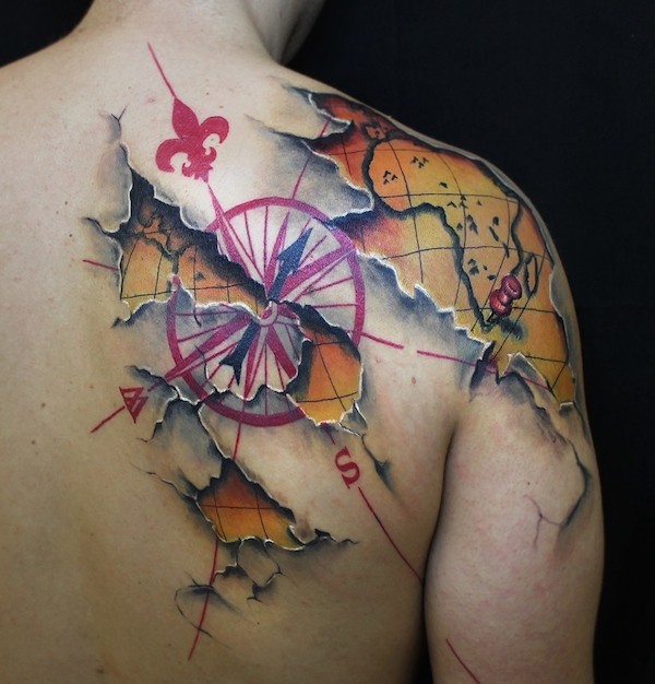 3D like nautical themed under skin shoulder and back tattoo of world map and compass