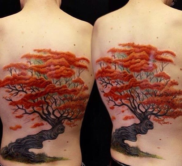 3D like very beautiful Asian style colored tree tattoo on back area