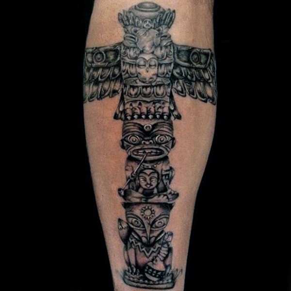 3D like very detailed ancient tribal statue tattoo on leg