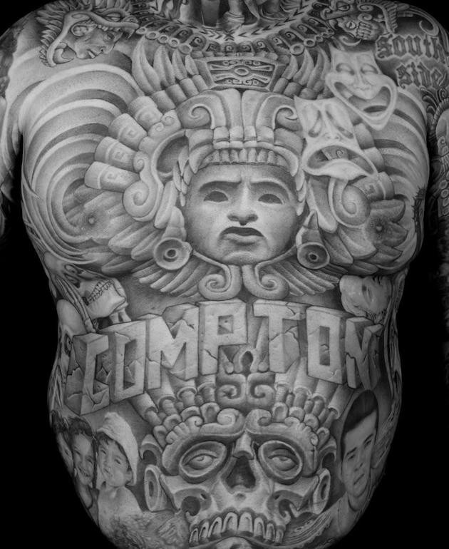 3D like very detailed massive tribal ornaments tattoo on whole body stylized with portraits and lettering