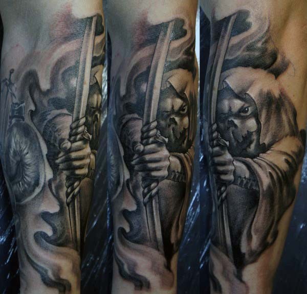 3D like very realistic detailed mystical monster archer tattoo on arm