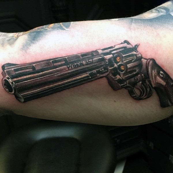 3D realism style colored biceps tattoo of detailed powerful revolver pistol