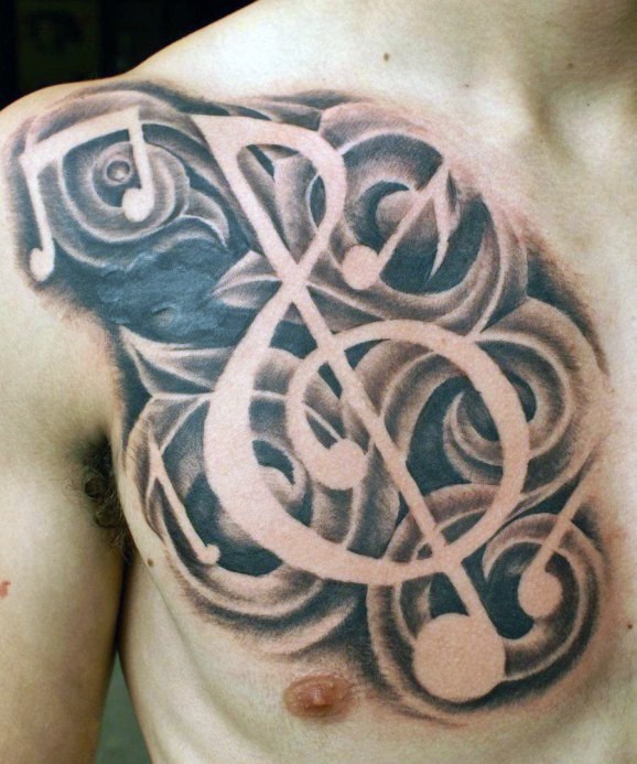 3D realistic black and white music notes tattoo on chest