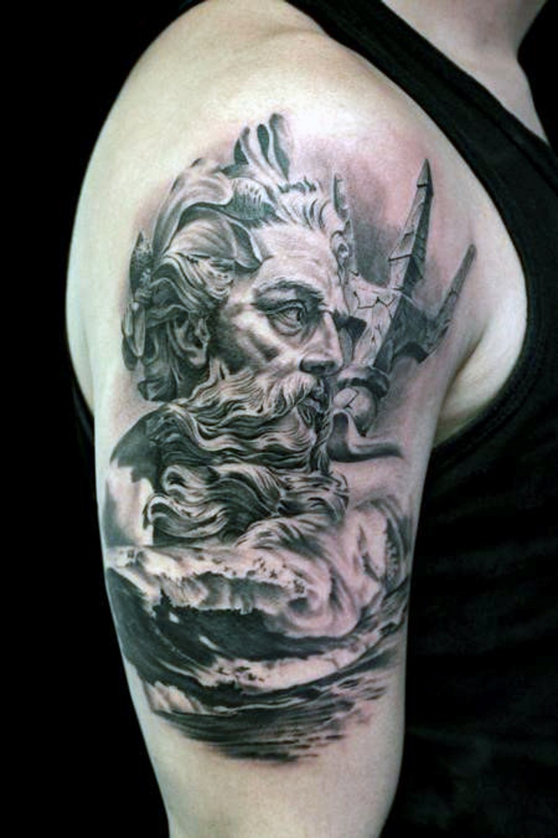 3D realistic black and white Poseidon statue in waves tattoo on upper arm