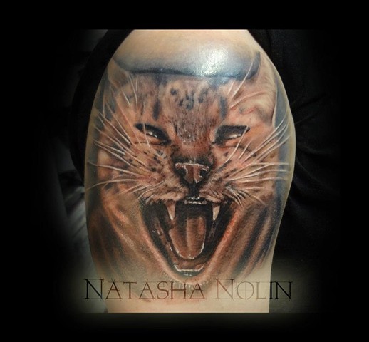 3D realistic colored natural angry cat shoulder tattoo by Natasha Nolin