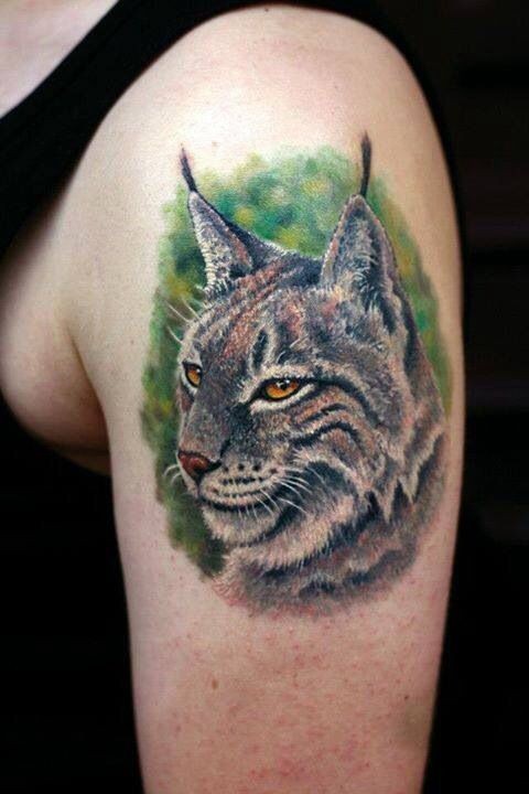 3D realistic colored photo like wild cat tattoo on shoulder
