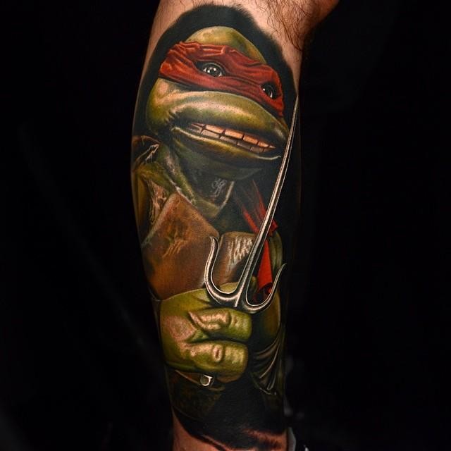 3D realistic Ninja turtle Raphael cartoon multicolored hero tattoo on arm