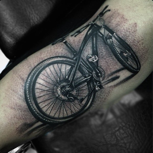3D realistic very detailed modern bicycle tattoo on arm