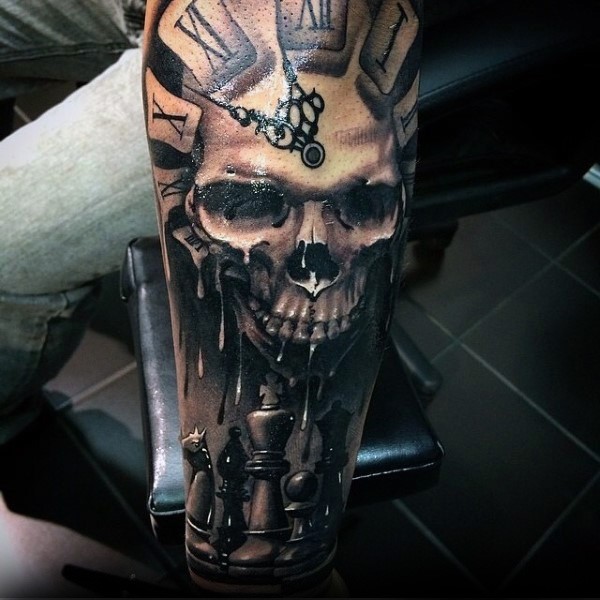 3D style amazing looking arm tattoo of human skull with clock and chess