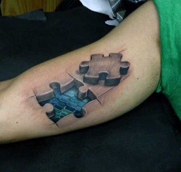 3D style amazing looking biceps tattoo of puzzle pieces and dragon skin