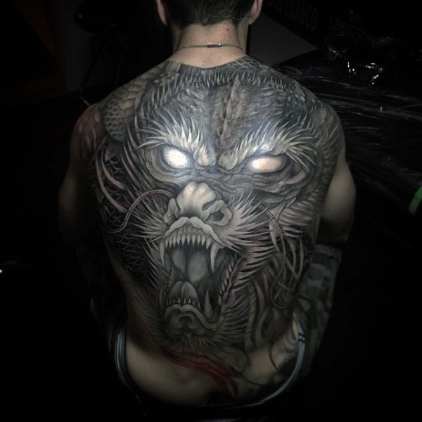 3D style amazing looking whole back tattoo of creepy dragon