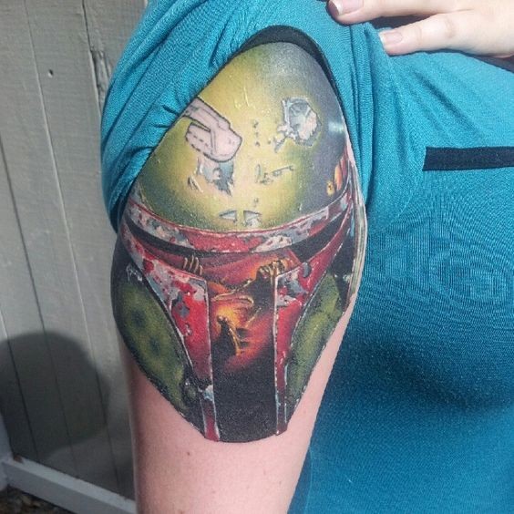 3D style big colored shoulder tattoo of corrupted Bobba Fett