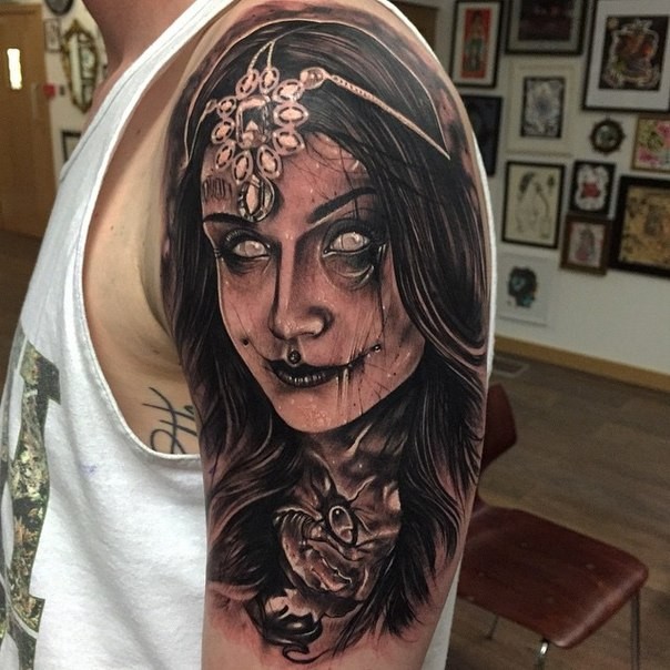 3D style black and white demonic woman portrait tattoo on shoulder with jewelry