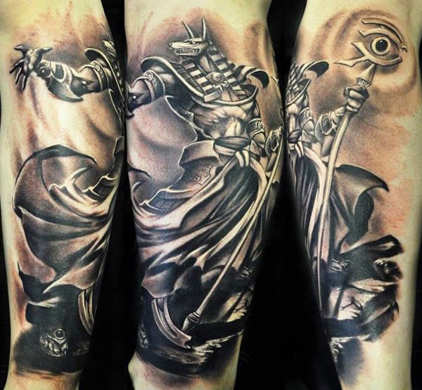3D style black and white detailed forearm tattoo of Anubis God