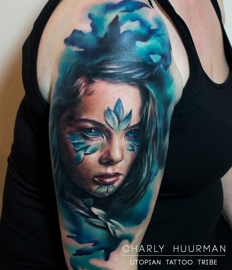 3D style breathtaking looking colored shoulder tattoo of woman portrait