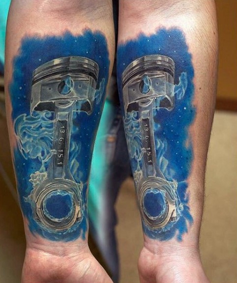 3D style colored car piston under water tattoo on forearm