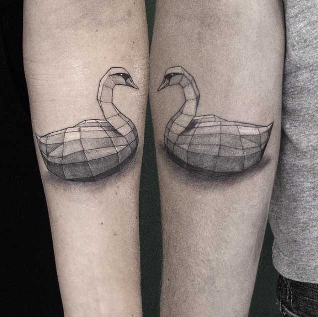 3D style colored forearm tattoo of geometrical swan