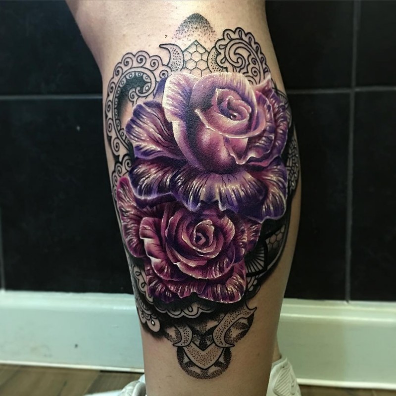 3D style colored leg tattoo of cool roses and ornaments