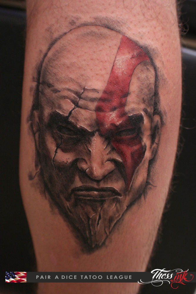 3D style colored little barbarian head with scars tattoo