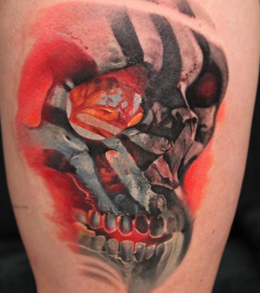 3D style colored thigh tattoo of human skull with ornaments
