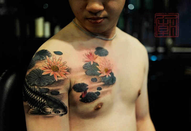 3D style colored water flowers tattoo on shoulder and chest with fish