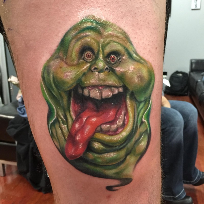 3D style funny looking tattoo of green ghost