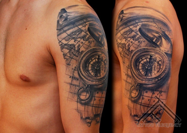 3D style gray washed style compass tattoo on shoulder combined with world map
