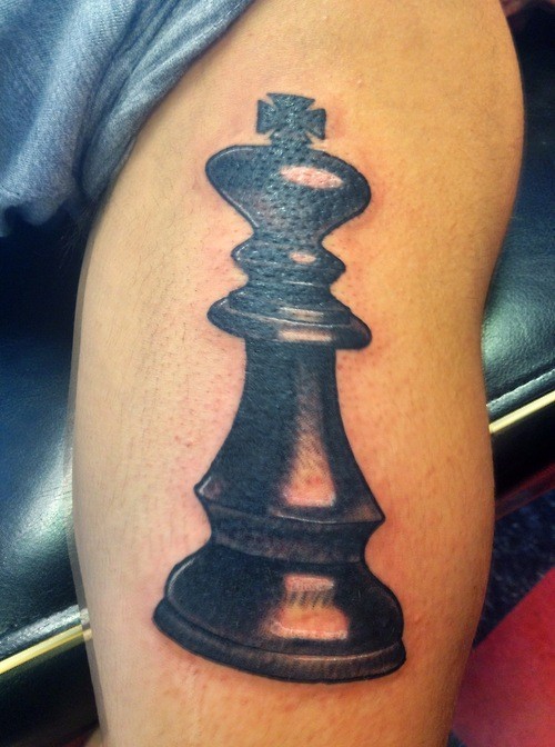 3D style large biceps tattoo of amazing chess figure